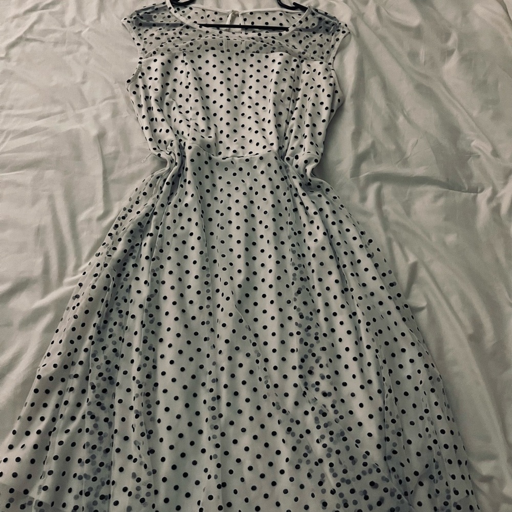Polka Dot Midi Dress mesh overlay at the top.